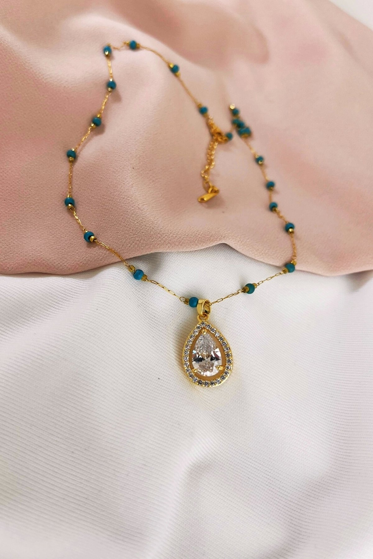 ÇELİK MAVİ BONCUK ZİRKON TAŞ DETAYLI KOLYE