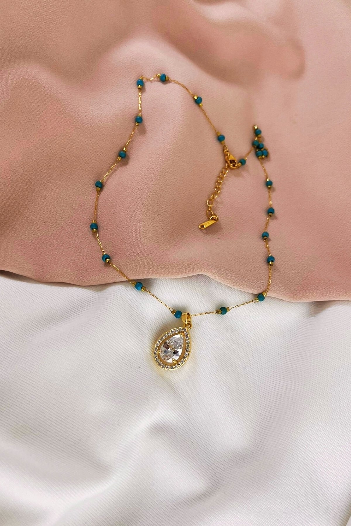 ÇELİK MAVİ BONCUK ZİRKON TAŞ DETAYLI KOLYE